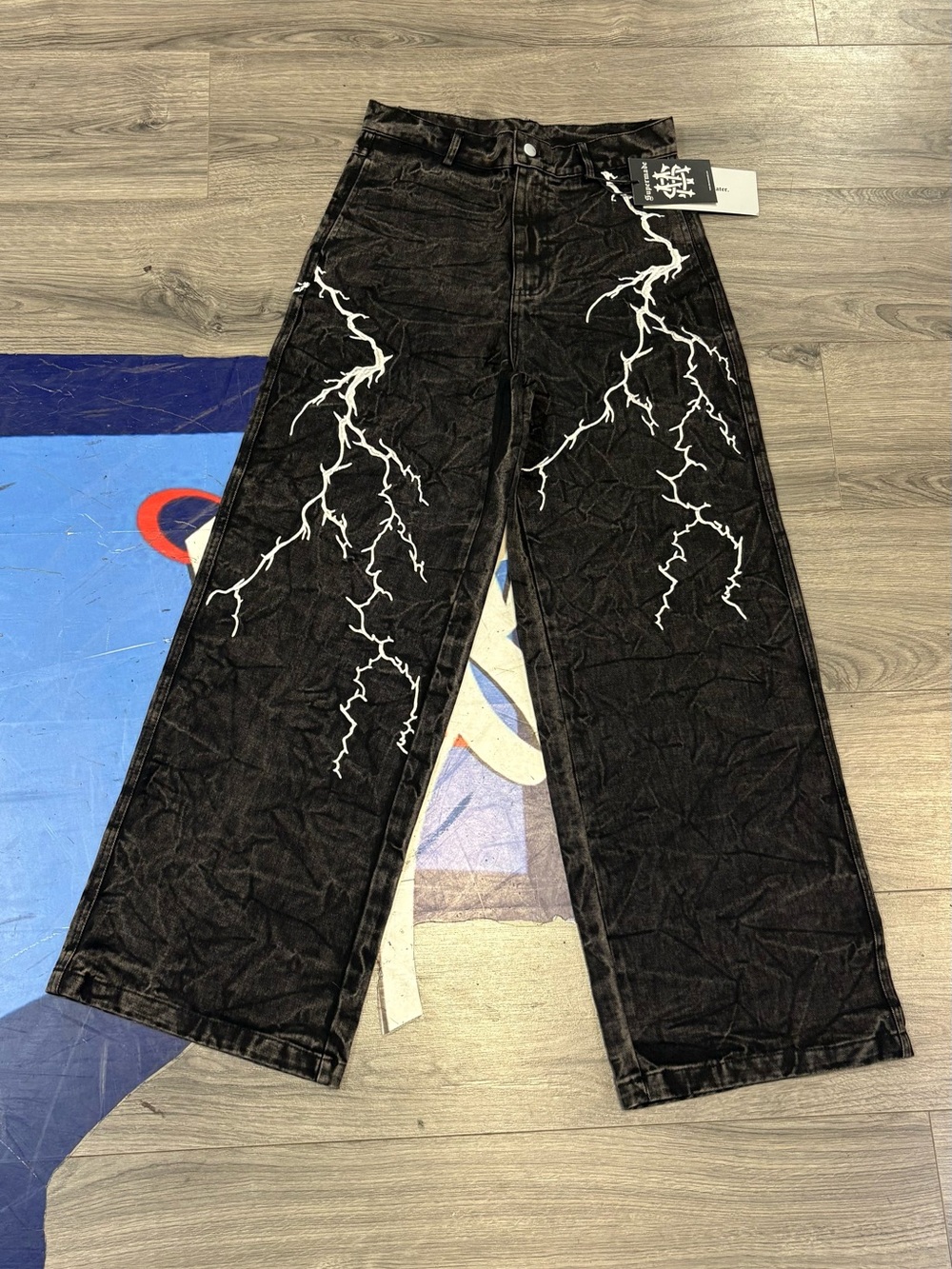 Supermade Black Wide-Leg Jeans with White Lightning Print